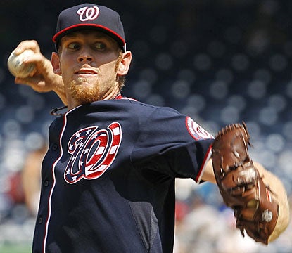 Stephen Strasburg strikes out four and gives up three hits in his second start 57-pitch outing. (AP)