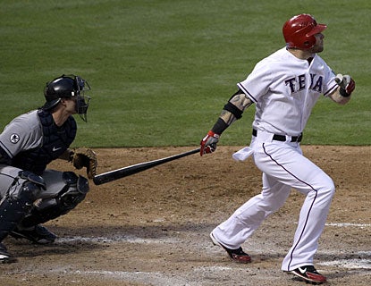 Josh Hamilton's third career grand slam keys an eight-run fourth inning in the Rangers' rout of the Tribe (AP)