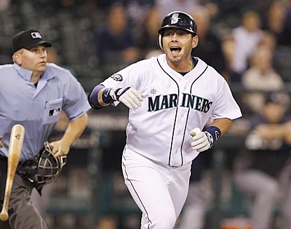 Luis Rodriguez knows right away his 12th-inning drive off Cory Wade is going to land in the right-field seats.  (AP)
