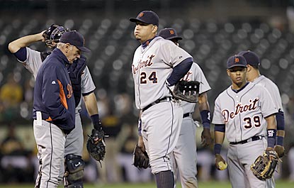 Jim Leyland, Miguel Cabrera and the rest of Tigers will have to wait until at least Friday to party in Oakland.  (AP)
