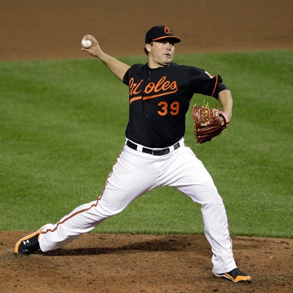 Tommy Hunter gives up seven hits, strikes out five and walks two while throwing seven scoreless innings.  (Getty Images)