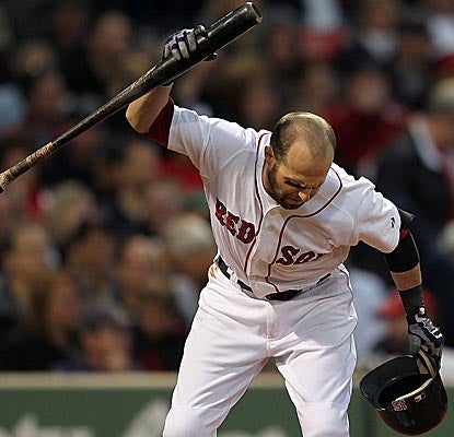 Going 0-for-4 on Saturday, Dustin Pedroia throws his bat after striking out in the seventh inning vs. the Rays. (Getty Images)