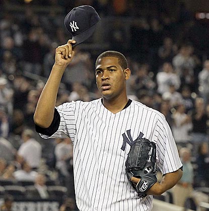 Yankees rookie Ivan Nova (16-4) tips his cap after another solid outing. He's 12-0 in 15 starts since June 3.  (Getty Images)