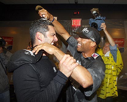 Two of the Yankees' old guard -- Jorge Posada and Mariano Rivera -- celebrate another American League East championship.  (Getty Images)