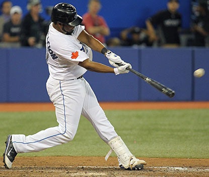Edwin Encarnacion caps the game in the 12th inning with this drive out of the park, his 17th homer this season. (US Presswire)