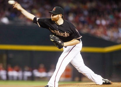 Ian Kennedy allows two runs and five hits through six dominant innings against  the Giants.  (Getty Images)