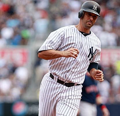 Jorge Posada rounds the bases after hitting a two-run homer in the third inning. (Getty Images)