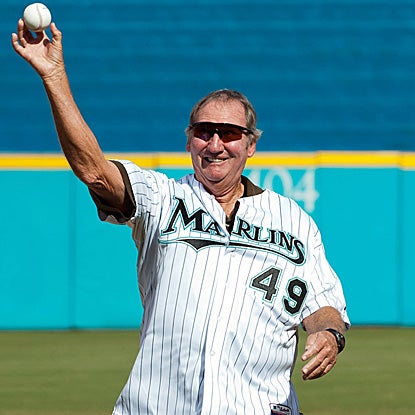 Former Marlins hurler Charley Hough throws out the ceremonial first pitch at the last game played at Sun Life Stadium. (US Presswire)