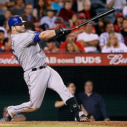 Mike Napoli breaks a 1-1 tie with his fourth homer in two games.  Texas clinches the number two seed. (AP)