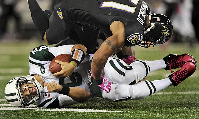 If the Jets don't get their ground game going, Sanchez will be spending more time on the turf. (Getty Images)