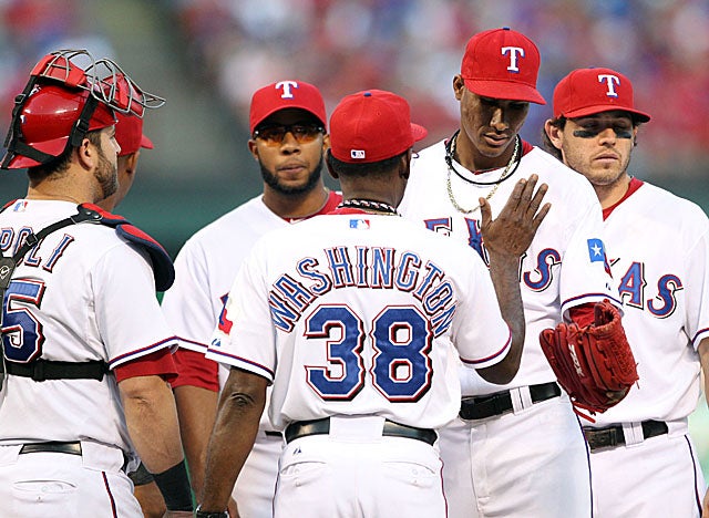 Alexi Ogando is the second of five pitchers the Rangers bring in from the bullpen in Game 2. (US Presswire)