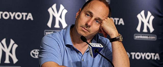 A day after a woman was charged with stalking Cashman, the Yanks GM's wife filed for divorce. (Getty Images)