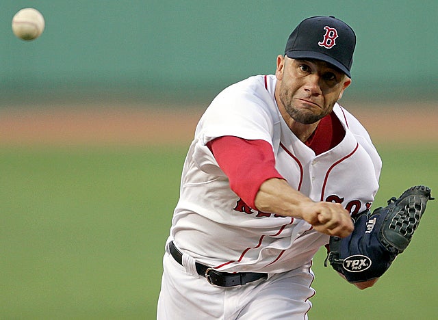 Alfredo Aceves is among those looking to break into the rotation as Boston heads into spring. (Getty Images)