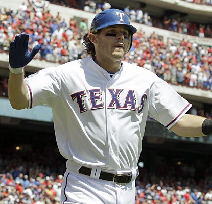 The Rangers' Ian Kinsler starts off the season strong as he provides a home run and a double in the win over the White Sox. (AP)