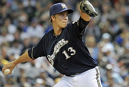 Zack Greinke gives up just three hits over seven innings of work as the Brewers get their first win of 2012.  (Getty Images)