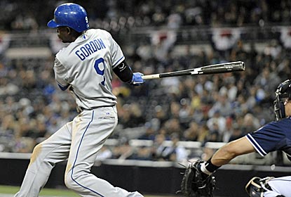 Dee Gordon delivers the game-winning hit in the top of the 11th as the Dodgers move to 2-0.  (Getty Images)