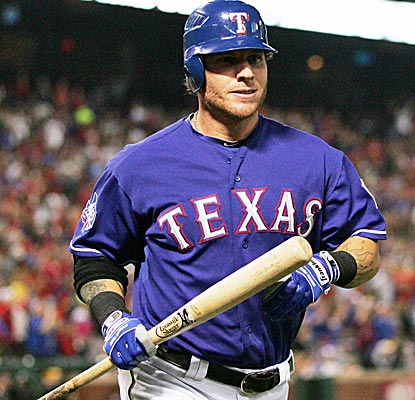 Josh Hamilton, who launches a towering home run on Sunday, has hit safely in each of the Rangers' three games.  (US Presswire)