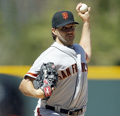 Barry Zito goes the distance and holds the Rockies to just four hits en route to his first shutout since April 18, 2003. (AP)