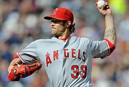 Almost lost in the Pujols hoopla, C.J. Wilson allows just three hits over seven strong innings in his Angels debut.  (Getty Images)
