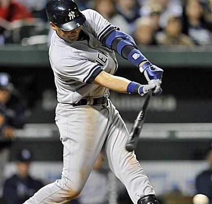 Derek Jeter grounds a single as part of a 4-for-4 night, helping the Yankees earn their first win.  (US Presswire)
