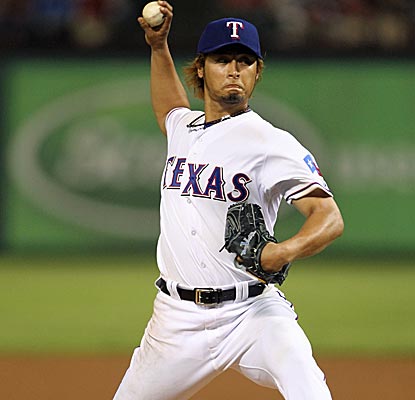 Rangers starter Yu Darvish recovers from a four-run first inning to earn his first major league win.  (US Presswire)