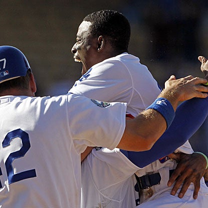 Dee Gordon's two-out single in the bottom of the ninth inning drives home the Dodgers' winning run.  (AP)