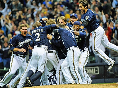The Brewers celebrate after beating the Dodgers in the bottom of the ninth inning, snapping their four-game losing skid. (US Presswire)
