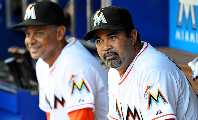 Ozzie Guillen gets back to the bench with bench coach Joey Cora after a five-game ban. (US Presswire)