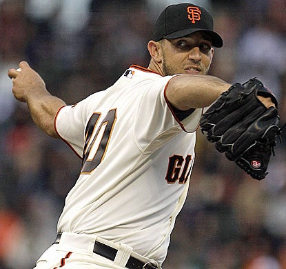 Madison Bumgarner gives up seven hits and a couple of runs in six-plus innings on the mound. (AP)