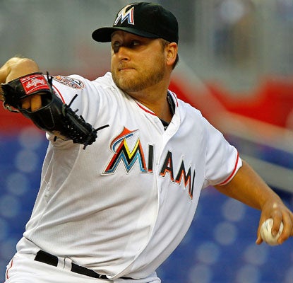 Mark Buehrle yields one run on six hits to earn his first Miami victory in his first start at Marlins Park.  (Getty Images)