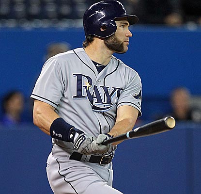 Luke Scott connects for a two-run double in the ninth inning as the DH's strong season continues.  (US Presswire)