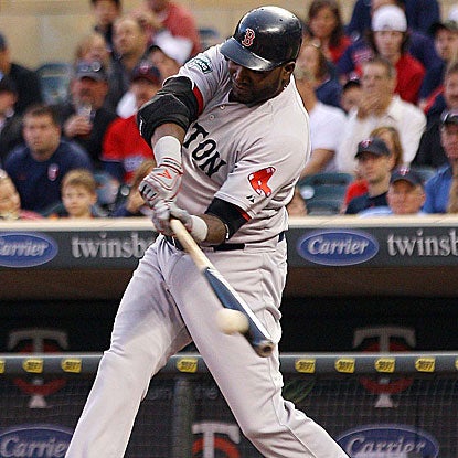 David Ortiz launches a home run that travels an estimated 429 feet in the Red Sox's victory.  (US Presswire)