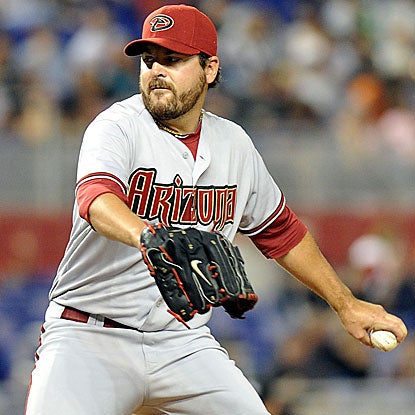 Joe Saunders goes the distance, holding the Marlins to three hits, for a complete-game shutout.  (US Presswire)