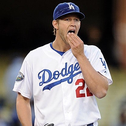 Clayton Kershaw allows three hits in eight innings to beat the Nationals and win his 10th straight decision. (Getty Images)