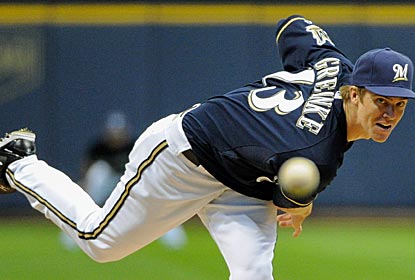 Zack Greinke works six strong innings, paving the way for closer John Axford to earn his 48th straight save.  (US Presswire)