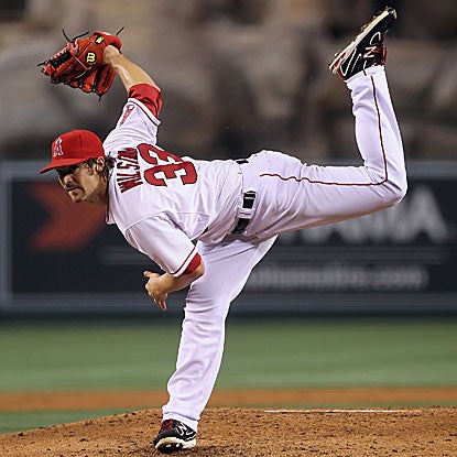C.J. Wilson allows all three of his earned runs in the eighth inning, but the Angels hold on to defeat the Twins.   (US Presswire)