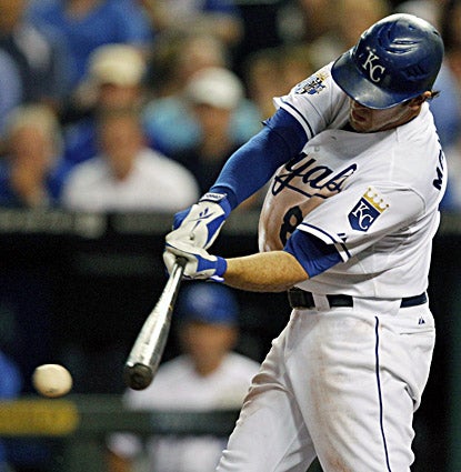 The Royals' Mike Moustakas belts a two-RBI single during the fifth inning against the Yankees. (AP)