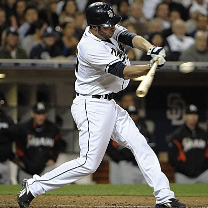 Pitcher Anthony Bass' three-run triple caps a six-run third inning for the Padres.  (Getty Images)