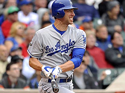 Chris Capuano not only pitches seven shutout innings with seven K's, he also hits a two-run double in the win. (Getty Images)