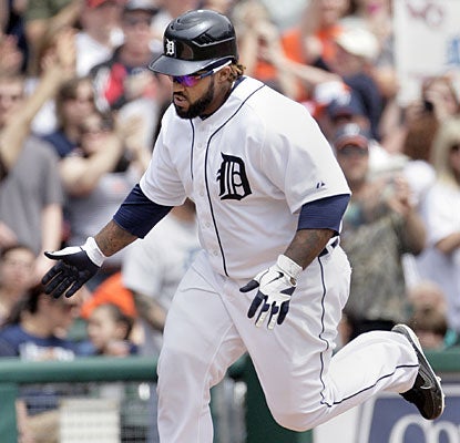 Prince Fielder rounds third base after hitting one of the Tigers' three solo home runs vs. Chicago. (AP)