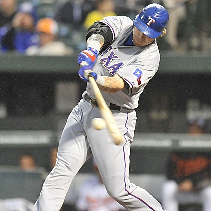 Josh Hamilton doubles and hits four home runs for 18 total bases, a new single-game American League record.  (Getty Images)
