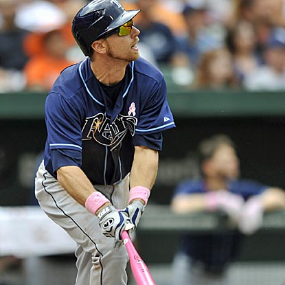 Ben Zobrist, who finishes with three RBI, watches his solo home run in the eighth inning of the Rays' victory.  (AP)