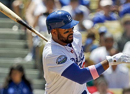 After grounding out in the third inning, Dodgers slugger Matt Kemp is removed from the game with a hamstring injury.  (AP)