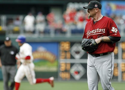 Brett Myers gives up a solo shot to Hunter Pence in the 10th inning -- the go-ahead run for the Phillies. (AP)