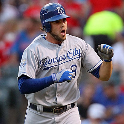 The Royals' Mike Moustakas homers to extend his consecutive games streak of reaching base to 22. (Getty Images)