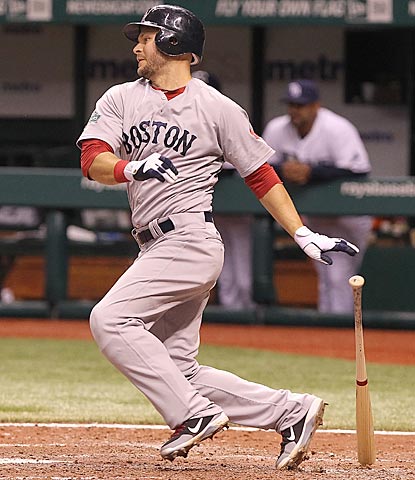 Cody Ross raps a two-out single in the eighth inning that pushes Boston's lead to 5-2.  (US Presswire)