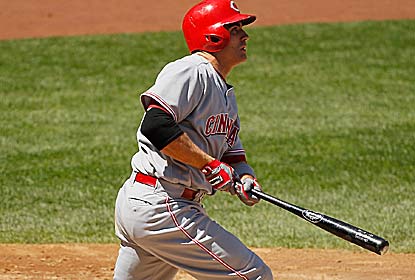 Joey Votto hits a three-run homer for the Reds, who overcome a 12-strikeout game by the Yanks' Ivan Nova. (Getty Images)