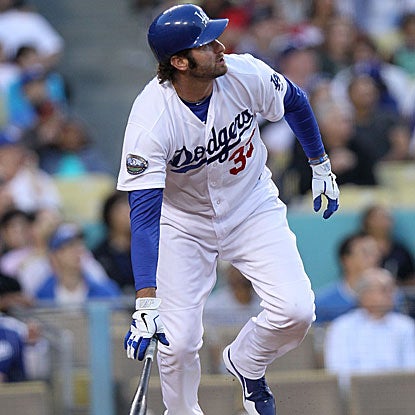 The Dodgers' Scott Van Slyke connects on a 3-0 pitch to launch a pinch-hit three-run homer, his first career round tripper.  (Getty Images)