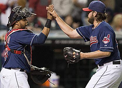 Chris Perez (right)  -- cheered after ripping Cleveland fans -- helps the Indians end a 10-game skid to the Tigers. (Getty Images)