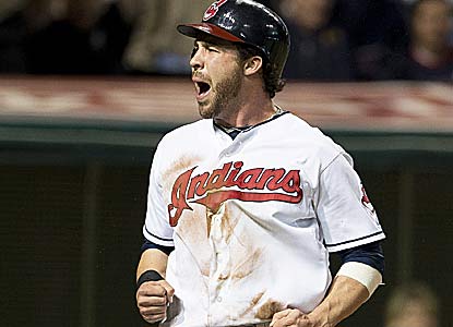 Jason Kipnis celebrates after recording three hits and scoring the go-ahead run for the Indians, who take the series. (Getty Images)